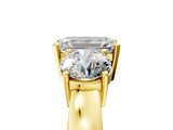 Yellow gold Three-Stone Emerald Cut Diamond Ring with Round Side Stones, Classic Band, and Four-Prong Setting_12