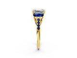 Yellow gold Three-Stone Emerald Cut Diamond Ring with Round with Blue Sapphire side stone Pavé Band and Prong Setting_2