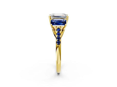 Yellow gold Three-Stone Emerald Cut Diamond Ring with Round with Blue Sapphire side stone Pavé Band and Prong Setting_2