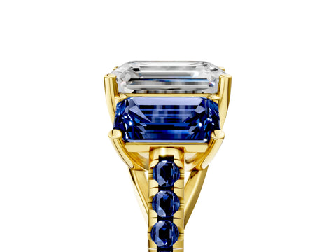 Yellow gold Three-Stone Emerald Cut Diamond Ring with Round with Blue Sapphire side stone Pavé Band and Prong Setting_5