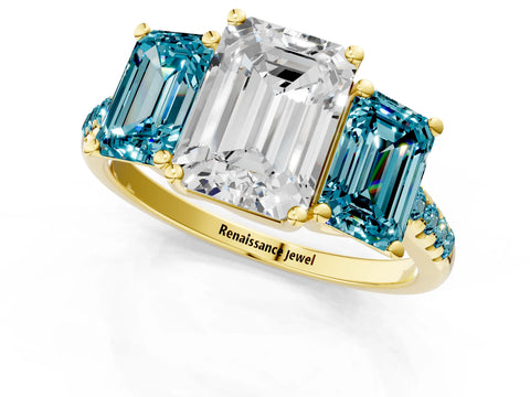 Yellow gold Three-Stone Emerald Cut Diamond Ring with Round with Blue Topaz side stone Pavé Band and Prong Setting_1