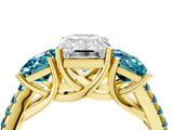 Yellow gold Three-Stone Emerald Cut Diamond Ring with Round with Blue Topaz side stone Pavé Band and Prong Setting_4