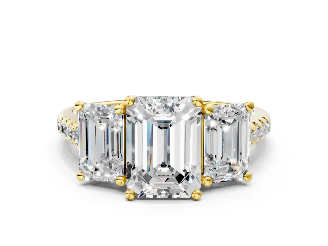 Yellow gold Three-Stone Emerald Cut Diamond Ring with Round with Moissanite side stone Pavé Band and Prong Setting