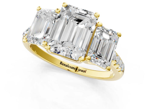 Yellow gold Three-Stone Emerald Cut Diamond Ring with Round with Moissanite side stone Pavé Band and Prong Setting_1