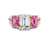 Yellow gold Three-Stone Emerald Cut Diamond Ring with Round with Pink Sapphire side stone Pavé Band and Prong Setting