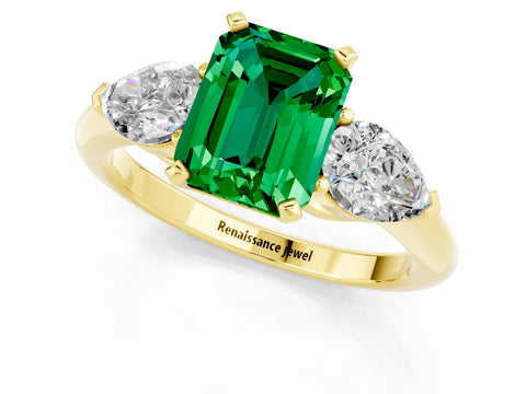 Yellow gold Three-Stone Emerald Cut Emerald Ring with Pear Side Stones and Four-Prong Setting_1