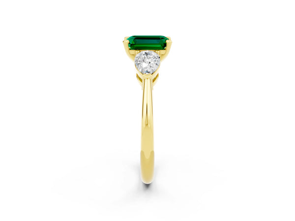 Yellow gold Three-Stone Emerald Cut Emerald Ring with Pear Side Stones and Four-Prong Setting