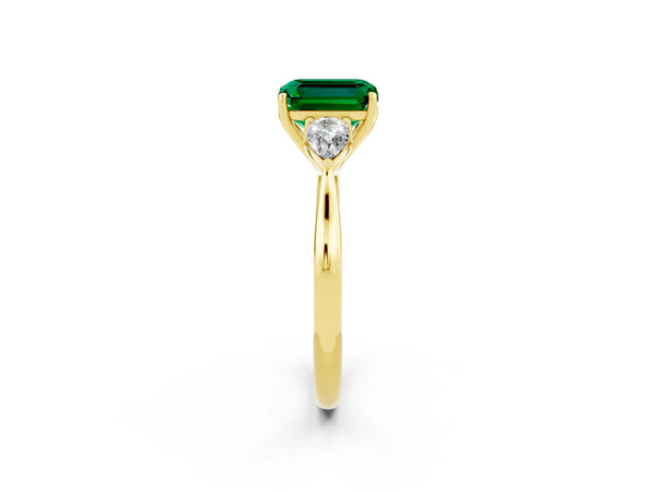 Yellow gold Three-Stone Emerald Cut Emerald Ring with Pear  Side Stones in Four-Prong Setting