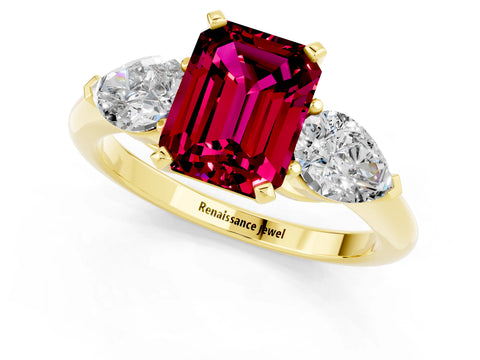 Yellow gold Three-Stone Emerald Cut Garnet Ring with Pear Side Stones and Four-Prong Setting_1