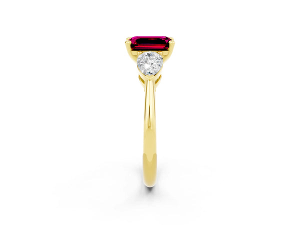 Yellow gold Three-Stone Emerald Cut Garnet Ring with Pear Side Stones and Four-Prong Setting