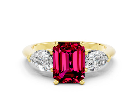 Yellow gold Three-Stone Emerald Cut Garnet Ring with Pear Side Stones and Four-Prong Setting