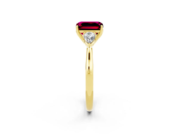 Yellow gold Three-Stone Emerald Cut Garnet Ring with Pear  Side Stones in Four-Prong Setting