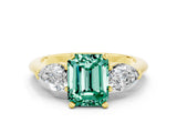 Yellow gold Three-Stone Emerald Cut Green Sapphire Ring with Pear Side Stones and Four-Prong Setting