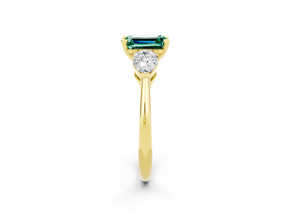 Yellow gold Three-Stone Emerald Cut Green Sapphire Ring with Pear Side Stones and Four-Prong Setting