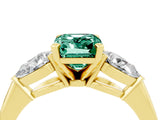 Yellow gold Three-Stone Emerald Cut Green Sapphire Ring with Pear Side Stones and Four-Prong Setting_4