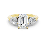 Yellow gold Three-Stone Emerald Cut Moissanite Ring with Pear Side Stones and Four-Prong Setting