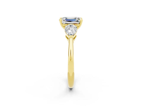 Yellow gold Three-Stone Emerald Cut Moissanite Ring with Pear Side Stones and Four-Prong Setting_2