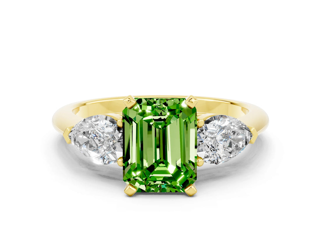 Yellow gold Three-Stone Emerald Cut Peridot Ring with Pear Side Stones and Four-Prong Setting
