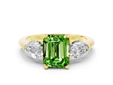 Yellow gold Three-Stone Emerald Cut Peridot Ring with Pear Side Stones and Four-Prong Setting