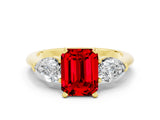 Yellow gold Three-Stone Emerald Cut Ruby Ring with Pear Side Stones and Four-Prong Setting