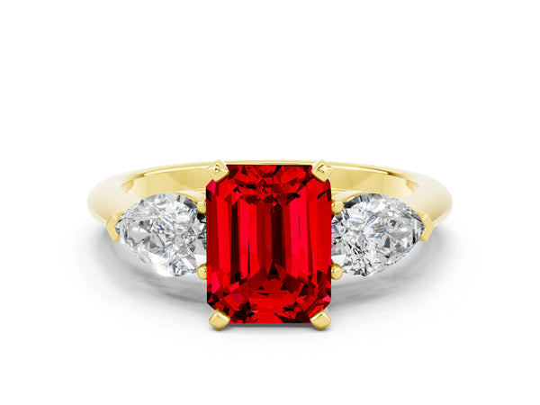 Yellow gold Three-Stone Emerald Cut Ruby Ring with Pear Side Stones and Four-Prong Setting