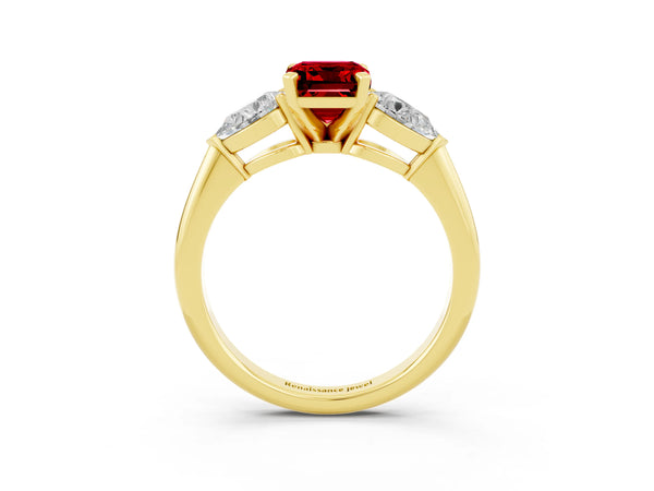 Yellow gold Three-Stone Emerald Cut Ruby Ring with Pear Side Stones and Four-Prong Setting