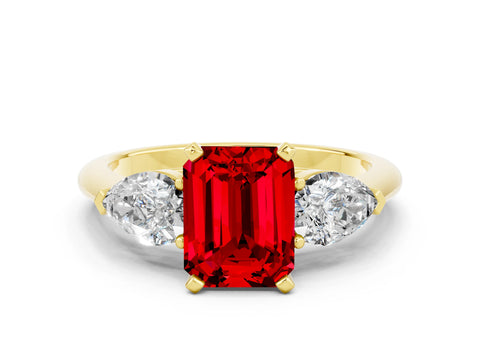 Yellow gold Three-Stone Emerald Cut Ruby Ring with Pear Side Stones and Four-Prong Setting