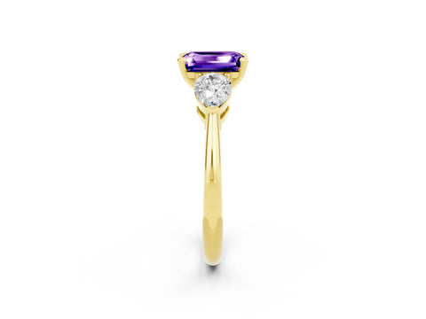 Yellow gold Three-Stone Emerald Cut Tanzanite Ring with Pear Side Stones and Four-Prong Setting_2