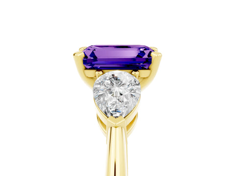 Yellow gold Three-Stone Emerald Cut Tanzanite Ring with Pear Side Stones and Four-Prong Setting_5