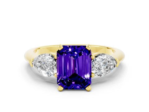 Yellow gold Three-Stone Emerald Cut Tanzanite Ring with Pear Side Stones and Four-Prong Setting