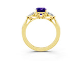 Yellow gold Three-Stone Emerald Cut Tanzanite Ring with Pear  Side Stones in Four-Prong Setting_15