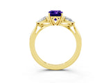 Yellow gold Three-Stone Emerald Cut Tanzanite Ring with Pear  Side Stones in Four-Prong Setting_39