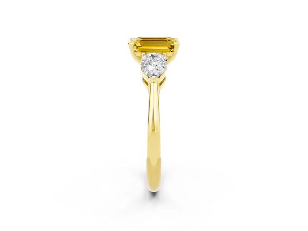 Yellow gold Three-Stone Emerald Cut Yellow Sapphire Ring with Pear Side Stones and Four-Prong Setting