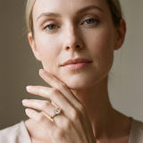 Yellow gold Three-Stone Emerald Diamond Engagement Ring with Prong Setting on a Classic Band_4