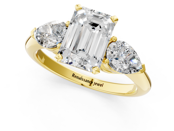 Yellow gold Three-Stone Emerald Cut Diamond Ring with Pear Side Stones and Four-Prong Setting