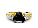Yellow gold Three-Stone Fancy Black Heart Cut Cut Diamond Ring with Trillion Side Stones on a Split Shank Band