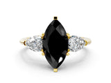 Yellow gold Three-Stone Fancy Black Marquise Cut Diamond Ring with Pear Side Stones and Four-Prong Setting