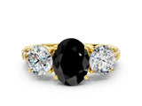 Yellow gold Three-Stone Fancy Black Oval Cut Cut Diamond Ring with Channel-Set Band and Prong Setting