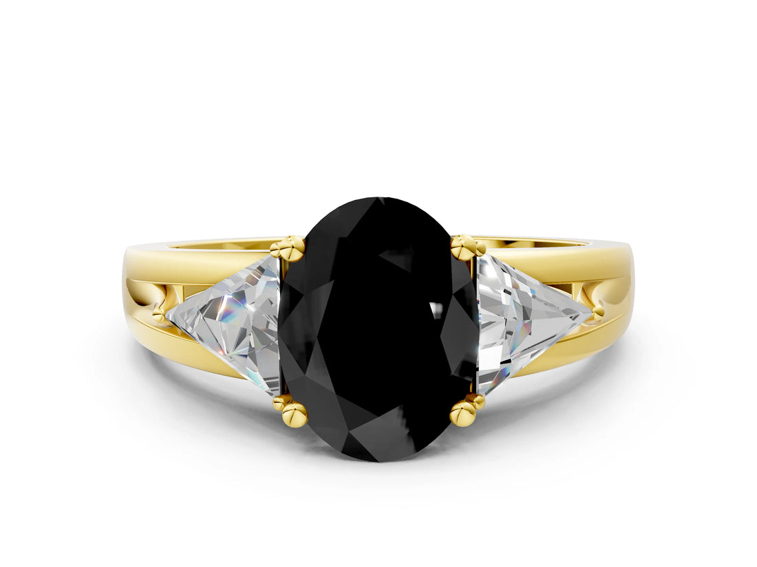 Yellow gold Three-Stone Fancy Black Oval Cut Cut Diamond Ring with Trillion Side Stones on a Split Shank Band