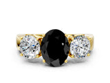 Yellow gold Three-Stone Fancy Black Oval Cut Diamond Ring with Round Side Stones, Classic Band, and Four-Prong Setting
