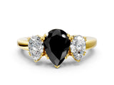 Yellow gold Three-Stone Fancy Black Pear Cut Cut Diamond Ring with Channel Set Band and Four-Prong Setting