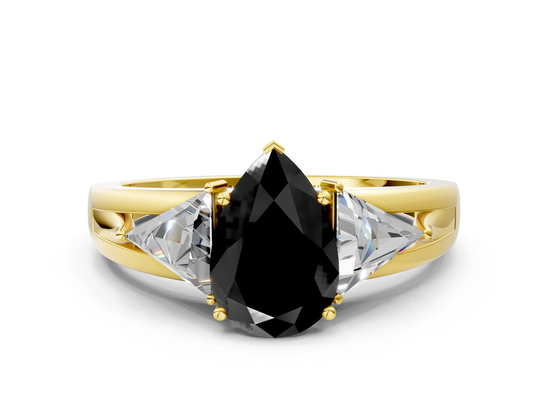 Yellow gold Three-Stone Fancy Black Pear Cut Cut Diamond Ring with Trillion Side Stones on a Split Shank Band