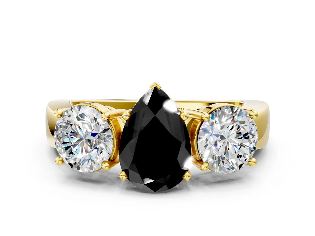 Yellow gold Three-Stone Fancy Black Pear Cut Diamond Ring with Round Side Stones, Classic Band, and Four-Prong Setting