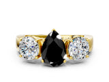 Yellow gold Three-Stone Fancy Black Pear Cut Diamond Ring with Round Side Stones, Classic Band, and Four-Prong Setting