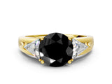 Yellow gold Three-Stone Fancy Black Round Cut Cut Diamond Ring with Trillion Side Stones on a Split Shank Band
