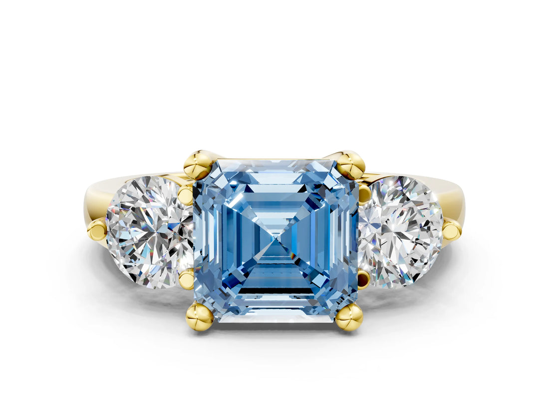 Yellow gold Three-Stone Fancy Blue Asscher  Brilliant Cut Solitaire Ring with Prong Setting on a Classic Band