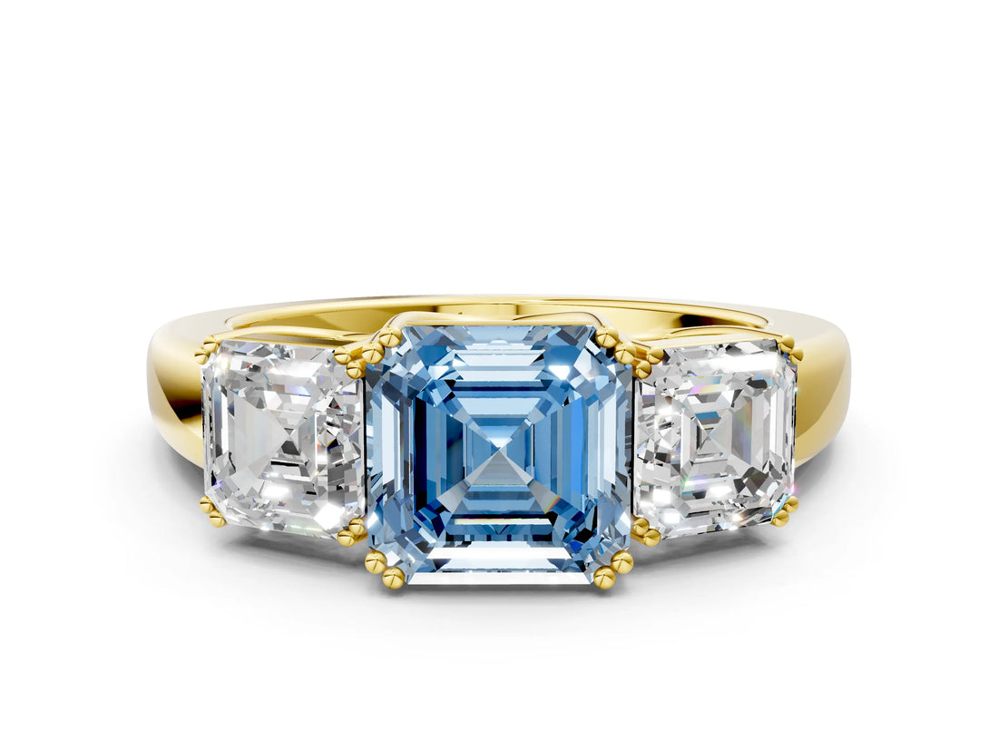 Yellow gold Three-Stone Fancy Blue Asscher Cut Cut Diamond Ring with Channel Set Band and Four-Prong Setting
