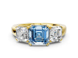 Yellow gold Three-Stone Fancy Blue Asscher Cut Cut Diamond Ring with Channel Set Band and Four-Prong Setting