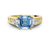 Yellow gold Three-Stone Fancy Blue Asscher Cut Cut Diamond Ring with Trillion Side Stones on a Split Shank Band