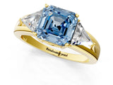 Yellow gold Three-Stone Fancy Blue Asscher Cut Cut Diamond Ring with Trillion Side Stones on a Split Shank Band_1